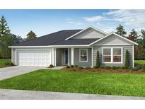 Charming single-story home with a well-maintained lawn and attached two car garage at Tbd Spy Glass Dr, Fuquay Varina, NC 27526