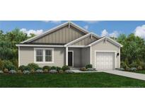 One-story house with gray siding, landscaping, and a two-car garage at 289 Greenbay (Lot 575) St, Lillington, NC 27546