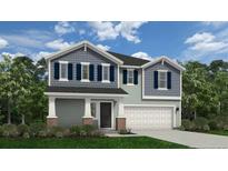 Two-story home with gray siding,navy shutters, and a two-car garage at 3 Bennington (Lot 561) Way, Lillington, NC 27546