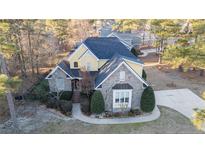 Stunning two-story home with stone accents and a large backyard at 14 Old Pine Ct, Spring Lake, NC 28390