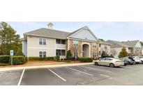 Well-maintained building exterior with ample parking at 310 Gallery Dr # 201, Spring Lake, NC 28390