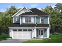 Two-story house with blue siding, white trim, and a two-car garage at 17 Tackett Ct, Lillington, NC 27546