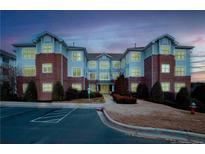 Charming multi-Gathering residential building with brick facade and manicured landscaping, offers a welcoming curb appeal at 1222 Waterford Lake Dr, Cary, NC 27519