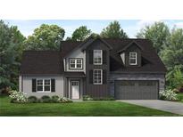 Two-story home with gray and black siding, stone accents, and a two-car garage at 145 Mahogany Ct, Cameron, NC 28326