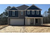 New two-story home featuring a two-car garage, covered front porch, and attractive gray and blue color scheme at 10 Bennington Way, Lillington, NC 27546