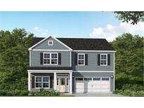 Charming two-story home with stone accents, a covered porch, two-car garage and neutral color palette at 305 Harborwood St, Lillington, NC 27546