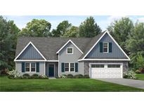 Charming new construction home with blue and gray accents, a two car garage and a manicured lawn at 137 Virginia Pine Dr, Cameron, NC 28326