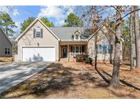 Charming single-Gathering home with a two-car garage and a well-manicured front lawn at 45 Cutter Cir, Sanford, NC 27332