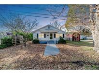 Charming single-story home with a well-maintained front yard and inviting entrance at 802 E Canary St, Dunn, NC 28334