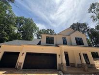 Charming two-story home with a large front-facing two car garage and covered porch at 96 Peach Orchard (Lot 5) Ln, Lillington, NC 27546
