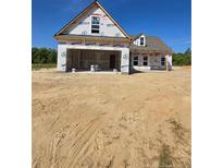 New construction home with a modern design and visible framing details, ready for customization at 45 Blackgum Ct, Spring Lake, NC 28390