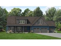 Charming two-story home featuring a covered front porch, three-car garage, and stone accents at 496 Persimmon Tree Dr, Cameron, NC 28326