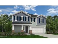 Charming two-story home featuring a classic design, a two-car garage, and well-manicured landscaping at 53 Horse Trot Ln, Sanford, NC 27332