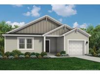 Charming single story home showcasing a mix of vertical and horizontal siding, complemented by lush greenery and a well-manicured lawn at 72 Greenbay Street, Lillington, NC 27546