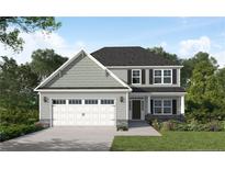Charming two-story home featuring a two-car garage, black shutters, and landscaped front yard at 356 Hookbill (Lot 107) Ln, Lillington, NC 27546