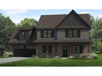 Charming two-story home features a stone accent facade, covered porch, black trim, and an attached two-car garage at 143 Persimmon Tree Dr, Cameron, NC 28326
