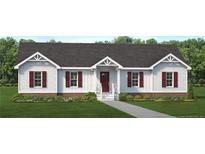 Charming single-story home with white siding, brick accents, and manicured lawn at 1402 Pennsylvania Ave, Sanford, NC 27332