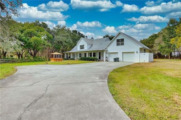 Photo one of 6936 Handcart Rd Wesley Chapel FL 33545 | MLS O6270948