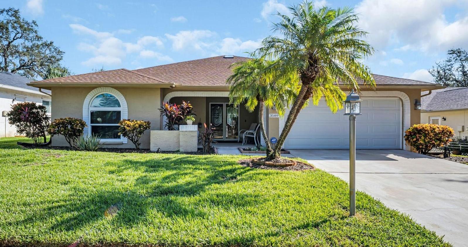 Photo one of 3589 Oak Lake Dr Palm Harbor FL 34684 | MLS TB8320193