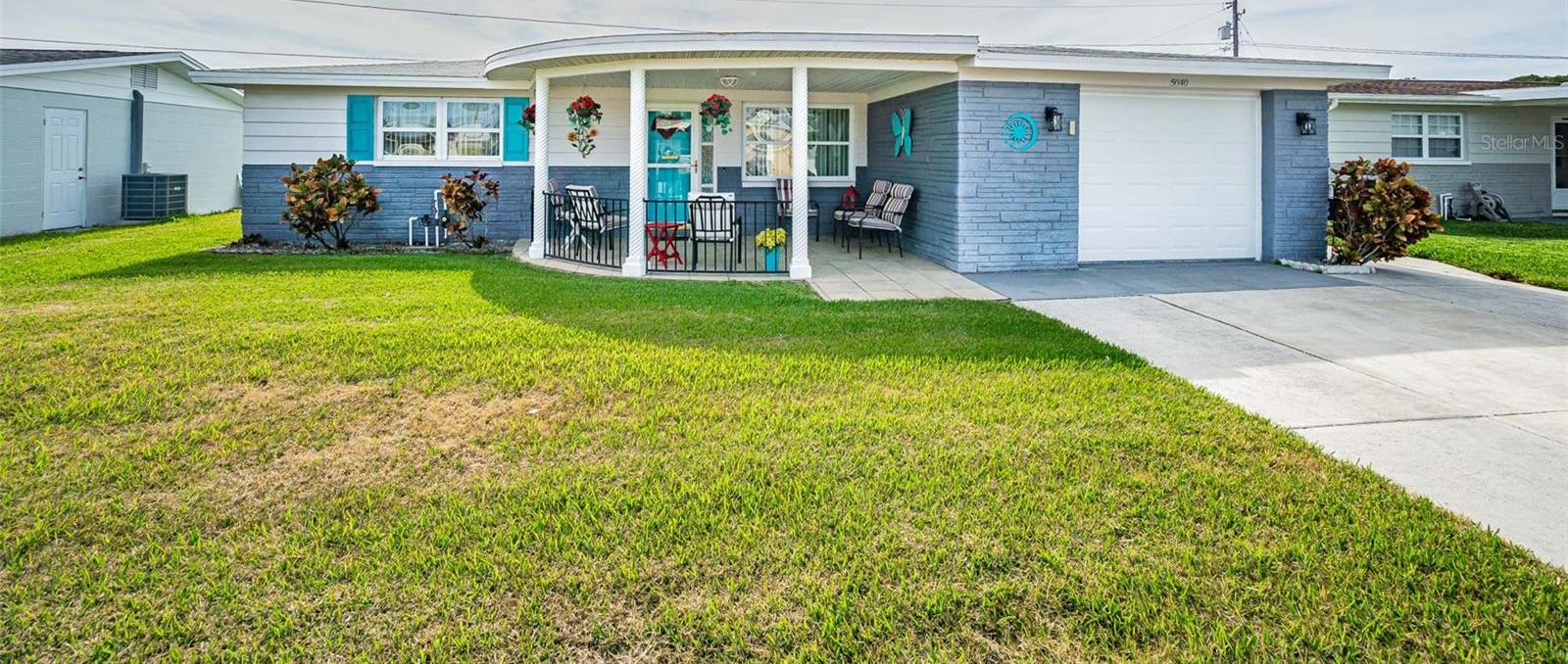 Photo one of 5040 Victoria Ln Holiday FL 34690 | MLS TB8344467