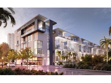 Modern building with multiple units, balconies, and street-level retail at 1305 4Th St # 501D, Sarasota, FL 34236