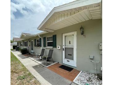 Exterior view of condo showing front door and walkway at 2687 Golf Course Dr # 219, Sarasota, FL 34234
