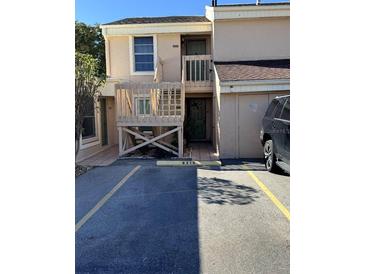 Two-story condo building with parking and a private balcony at 6312 7Th W Ave # 6312, Bradenton, FL 34209