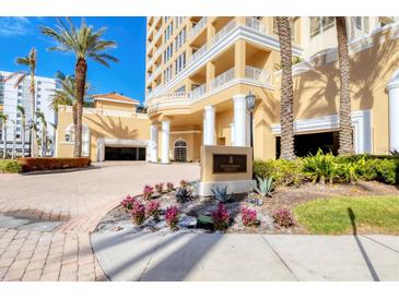 Luxury high-rise building with ocean views and gated entrance at 35 Watergate Dr # 1203, Sarasota, FL 34236