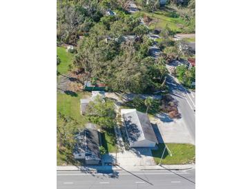 Aerial view showing commercial buildings near a road at 406 Laurel E Rd, Nokomis, FL 34275