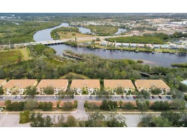 Aerial view of condo community near water at 5581 Key West Pl # 5581, Bradenton, FL 34203