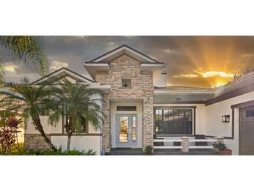Stunning curb appeal! This home features stone accents and a welcoming front entry at 6305 Royal Tern Cir, Lakewood Ranch, FL 34202
