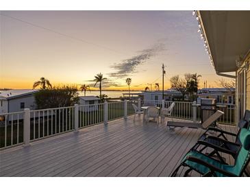 Relaxing deck overlooking peaceful waterfront sunset views at 4528 106Th W St, Bradenton, FL 34210