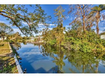 Serene canal view from backyard at 2961 Homasassa Rd, Sarasota, FL 34239