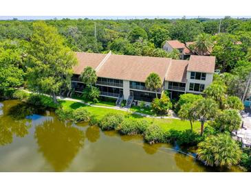 Aerial view of condo community showing building location and surrounding landscape at 5369 Lake Arrowhead Trl # 17A, Sarasota, FL 34231