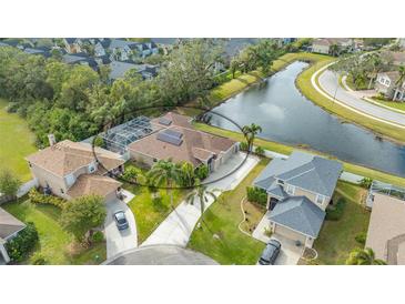Property view showcasing house, pool, and surrounding community at 5554 New Covington Dr, Sarasota, FL 34233