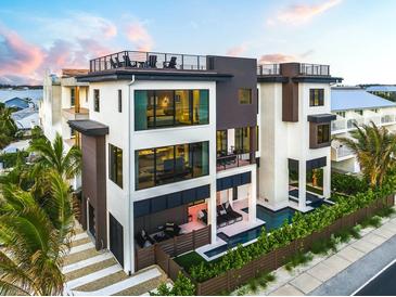Luxury beachfront home with private pool and rooftop deck at 101 7Th S St, Bradenton Beach, FL 34217