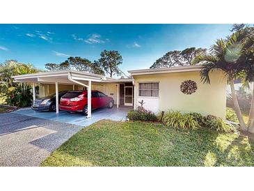 Updated condo with carport parking and tropical landscaping at 3522 Silver Pine Ct # 90, Sarasota, FL 34231