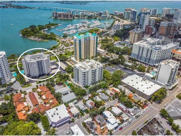 Aerial view of high-rise building near waterfront at 435 S Gulfstream Ave # 604, Sarasota, FL 34236