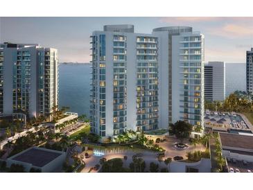 Luxury waterfront condo building with amazing water views and resort-style amenities at 555 Quay Commons # 402, Sarasota, FL 34236