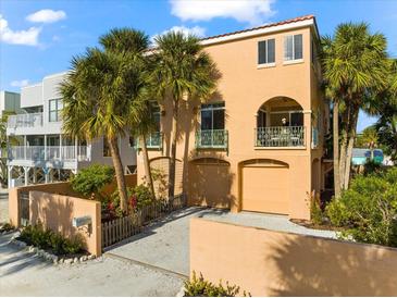 Beautiful two-story house with a garage and lush landscaping at 221 Tenacity Ln, Sarasota, FL 34242