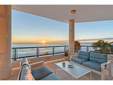 Spacious balcony with ocean views and comfortable seating at 655 Longboat Club Rd # 14A, Longboat Key, FL 34228