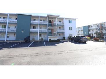 Building exterior showing parking and building facade at 5893 Welcome Rd # I-7, Bradenton, FL 34207