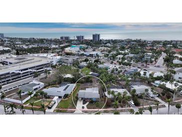 Aerial view of a house near beach and shopping area at 141 N Adams Dr, Sarasota, FL 34236