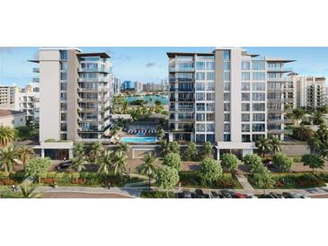 Luxury waterfront condo building with pool and parking at 223 Golden Gate Point # 2A, Sarasota, FL 34236