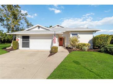 Single-story home with attached garage and landscaped lawn at 4534 Fern Dr, Bradenton, FL 34208