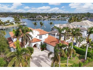 Luxury waterfront home with private dock and stunning sunset views at 1389 Tangier Way, Sarasota, FL 34239
