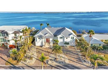 Luxury waterfront home with private dock and stunning bay views at 635 Key Royale Dr, Holmes Beach, FL 34217