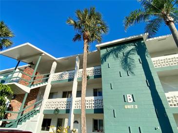 Two-story building with palm trees and ample parking at 5885 17Th W St # B21, Bradenton, FL 34207