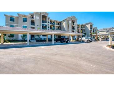 Covered parking garage with ample parking spaces for residents at 17520 Gawthrop Dr # 102, Bradenton, FL 34211