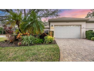 Well-maintained home with attractive landscaping and a two-car garage at 3484 Hadfield Greene # 22, Sarasota, FL 34235